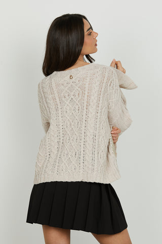 Maglia PSYLLOS manica lunga over con lavorazione trecce più spalmatura gold