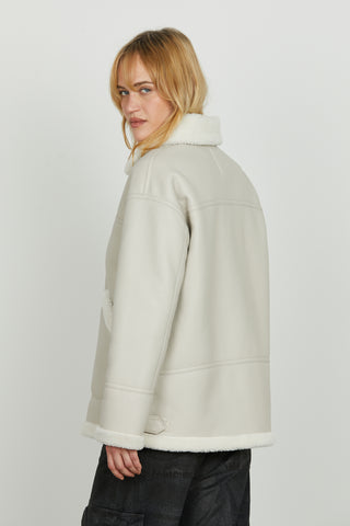 Montone FLORENCE manica lunga con pelliccetta più cinturini più tasche toppa ecopelle