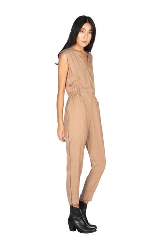 LONDON sleeveless jumpsuit with deep crossover neckline, elastic waist and pleat at the bottom