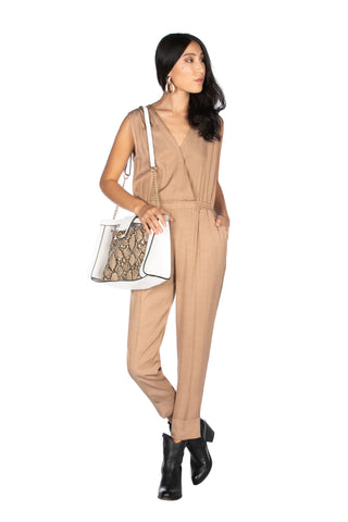 LONDON sleeveless jumpsuit with deep crossover neckline, elastic waist and pleat at the bottom