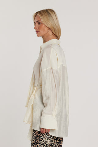 Blusa HALLE lunga maniche lunghe con incrocio più laccetto sul fianco più gale over