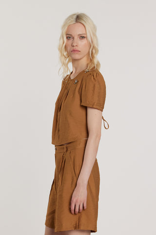 Blusa DEMARTY corta maniche corte con applicazioni gioiello più pieghe più oblò sulla schiena più coulisse