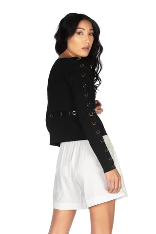 Short, long-sleeved JACK cardigan with gold rings and fabric inserts 