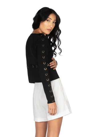 Short, long-sleeved JACK cardigan with gold rings and fabric inserts 